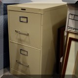 F61. 2-Drawer metal file cabinet. - $15